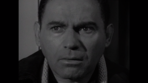 Nehemiah Persoff as Carl Lanser in Twilight Zone's "Judgment Night."