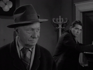 From the "Twilight Zone" episode "What You Need." Ernest Truix as Pedott and Steve Cochran as Fred Renard.