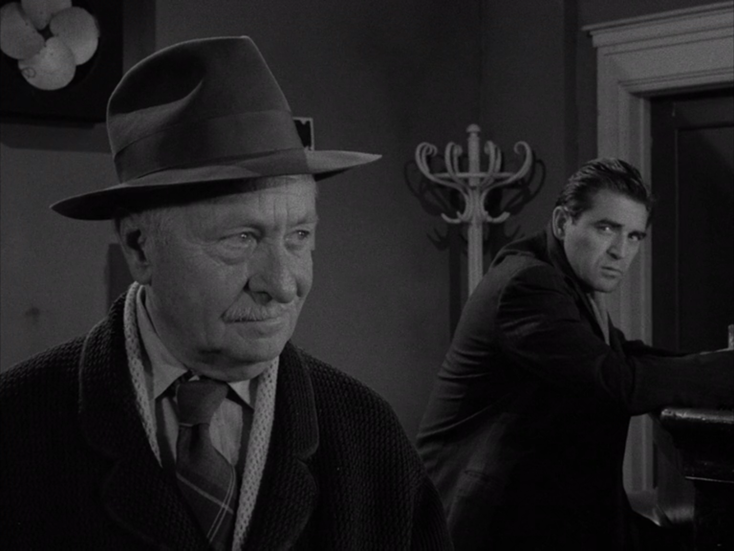 From the "Twilight Zone" episode "What You Need." Ernest Truix as Pedott and Steve Cochran as Fred Renard.