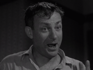 Joe Mantell as Jackie Rhoades from the Twilight Zone episode "Nervous Man in a Four Dollar Room"