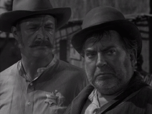 John Larch as Sheriff Koch and Thomas Gomez as Sykes from the Twilight Zone episode "Dust"